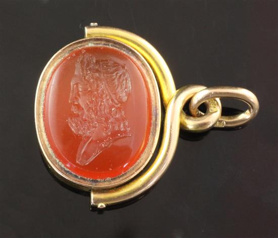 A late 19th/early 20th century Russian 56 zolotnik gold mounted carnelian intaglio fob seal pendant by Faberge, 28mm.